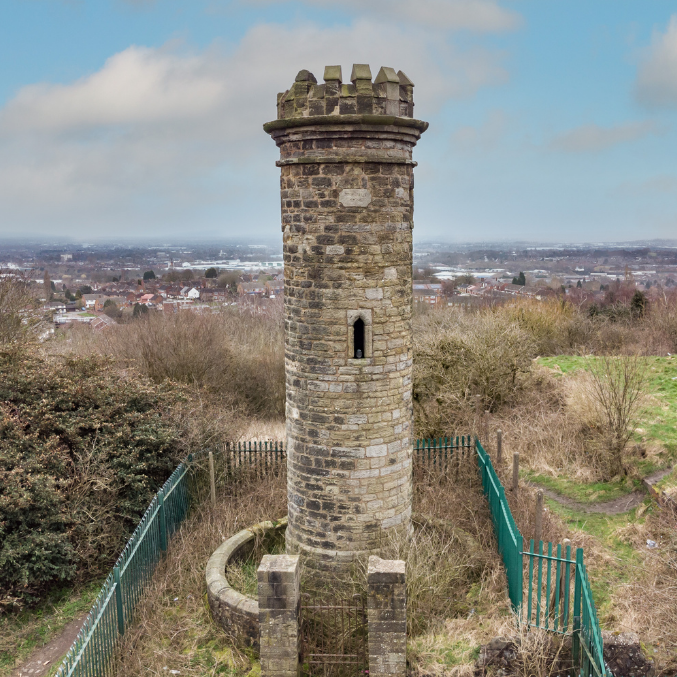Tall structured building in the Black Country with pretty landscape view behind